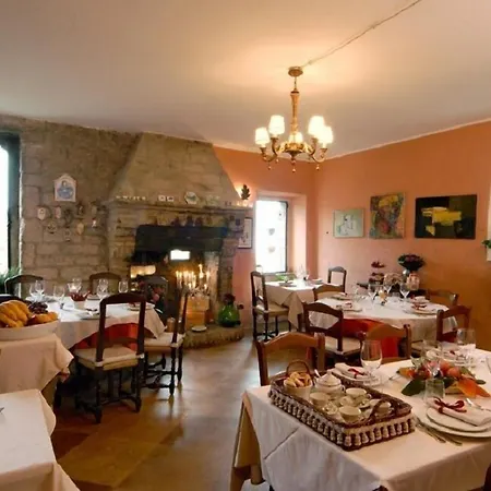 לינה וארוחת בוקר Torre Di Palme B&B